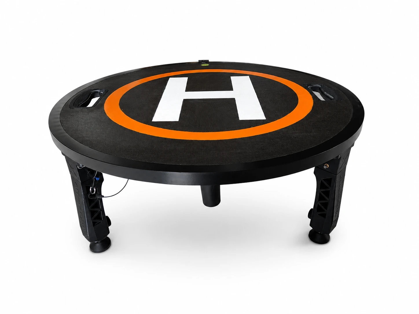 AEROPAD-X 80 ST with a rigid circular deck, orange landing ring and folding legs